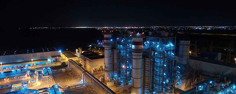 acwapower-plant-lit-up-blue-with-dark-evening-sky-barka